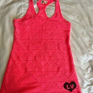 Neon pink bathing suit cover up